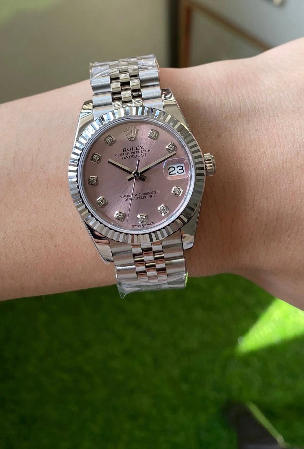 Rolex Pink Watch ( womans )